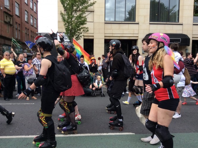 Roller Derby sisterhood skating in solidarity