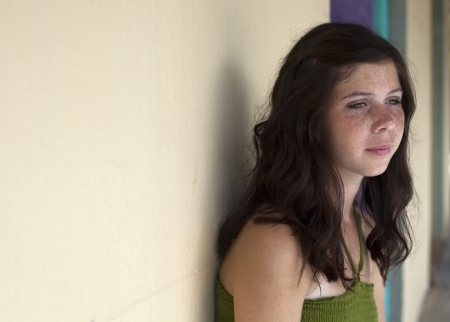 Young girl looking pensive