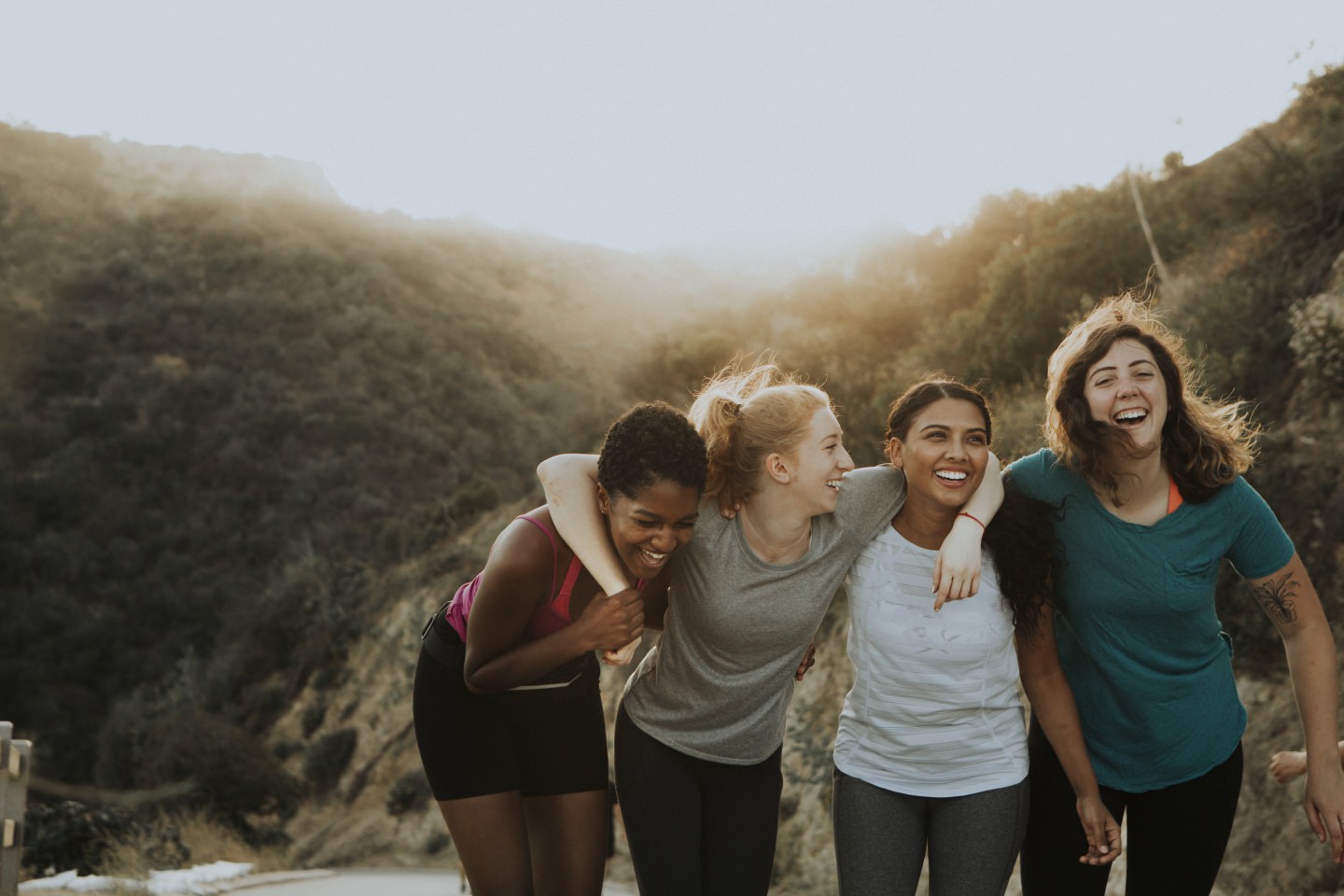 Friends Hiking Through The Hills Of Los Angeles